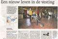 Krantenpagina Een nieuw leven in de vesting met foto van het winkelinterieur